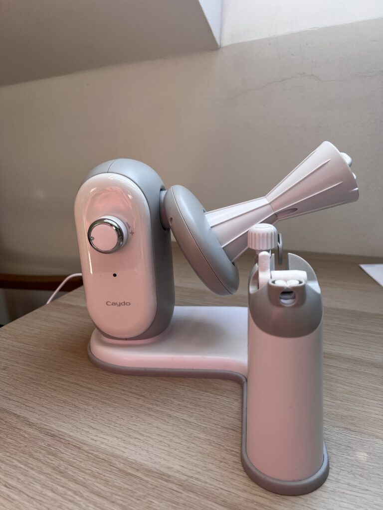 Side view of the Caydo A1 Pro Max electric yarn winder, with the cone spindle tilted and the adjustable tension dial on the motor housing