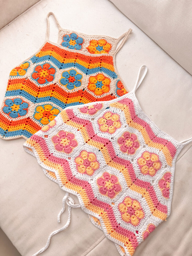 Flat lay of both Flower Power crochet top versions, closed back and backless